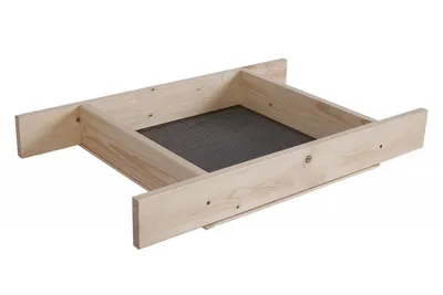 A wooden sieve with a mesh bottom is shown against a white background.