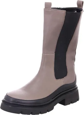 A single beige and black boot on a white background.