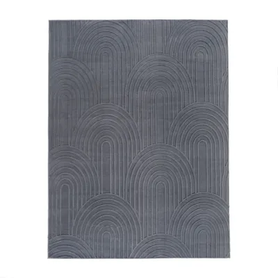 A flat lay of a gray rug with a geometric arch pattern.