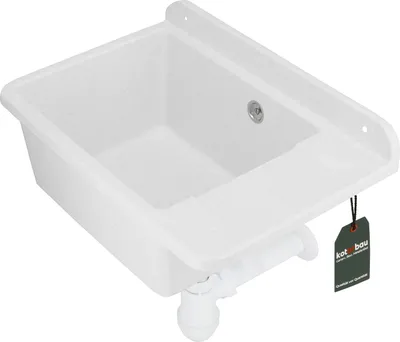 A white sink with plumbing fixtures attached, shown from a slightly elevated angle.