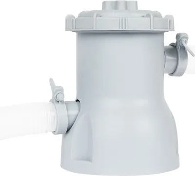 A light gray swimming pool cartridge filter pump with hoses attached.