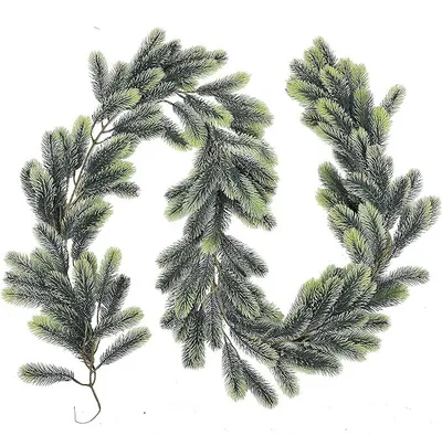 Two artificial pine garlands on a white background.