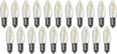 A collection of LED filament bulbs arranged in rows.
