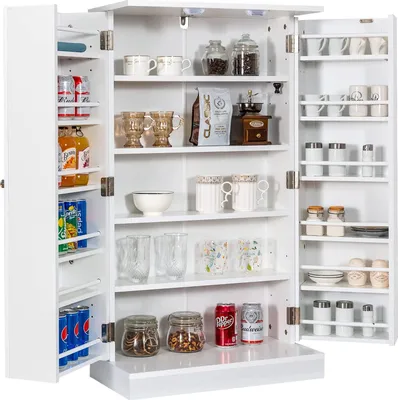 A white multi-door cabinet filled with various kitchen items, including mugs, jars, bottles, and cans.