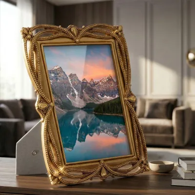 Immagine prodotto di Telaio per foto, formato 15x20 cm, color oro, marca Ramka