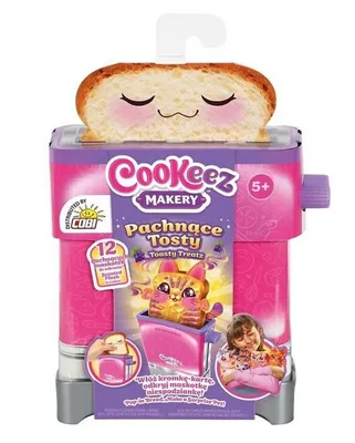 A toy toaster with a slice of bread with a face on it, and packaging for a toy.
