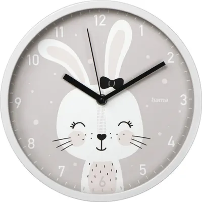 A close-up of a wall clock with a bunny design.
