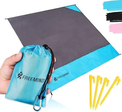Productafbeelding van Unyqoos® Picknick- en stranddeken – ultralicht, dun, 152 x 140 cm, waterafstotend, gemaakt van 210T-polyester, compact en zandvrij, inclusief tas, 4 haringen en een karabijnhaak