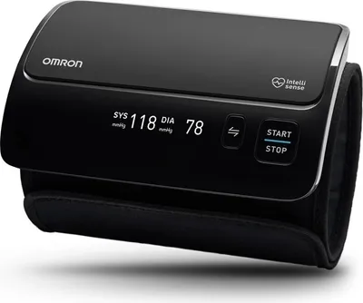 A black OMRON EVOLV ALL-IN-ONE, armless blood pressure monitor is shown against a white background.