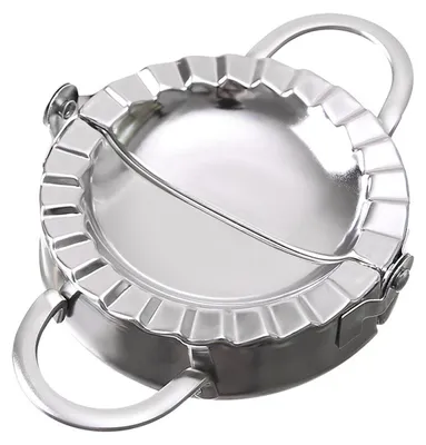 A stainless steel dumpling maker with handles.