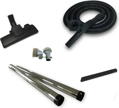 A collection of vacuum cleaner attachments laid out on a white background.