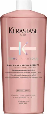 A bottle of Kérastase Chroma Absolu Bain Riche Chroma Respect shampoo.
