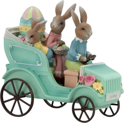 Produktbild von Hasenfamilie sitzend im Auto