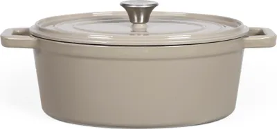 A beige enameled Dutch oven with a silver knob on its lid, set against a white background.
