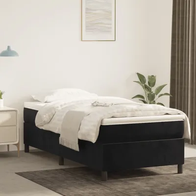 A bedroom scene with a single bed.