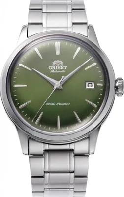A close-up studio shot of a silver and green Orient automatic watch.
