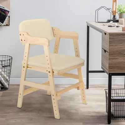 A wooden chair with beige cushions is placed next to a desk in a room.