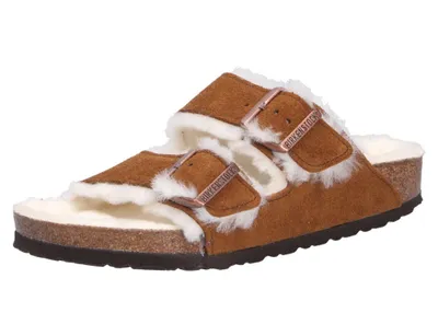 A single Birkenstock Arizona sandal with shearling lining is shown against a white background.