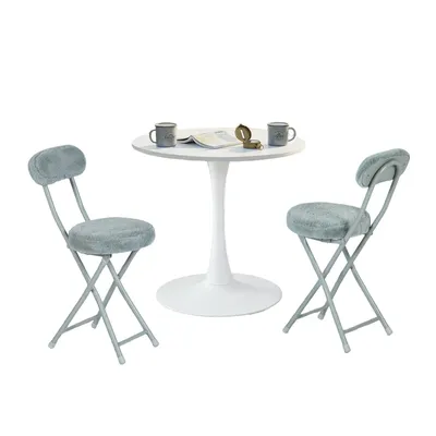 Image de Ensemble de table et chaises "Cosy" de style scandinave, comprenant une table ronde blanche et quatre chaises pliantes blanches