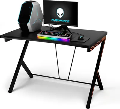A gaming desk setup with a computer tower, monitor, and keyboard.