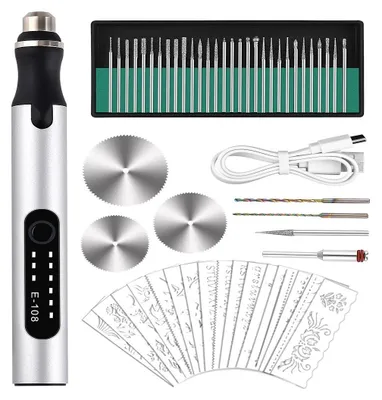 A collection of engraving tools and accessories laid out on a white background.