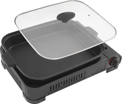 A portable gas stove with a grill pan and lid, shown from a diagonal angle.