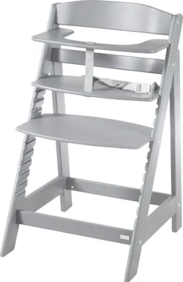 A gray wooden high chair with a tray and safety straps, shown from the front-left.
