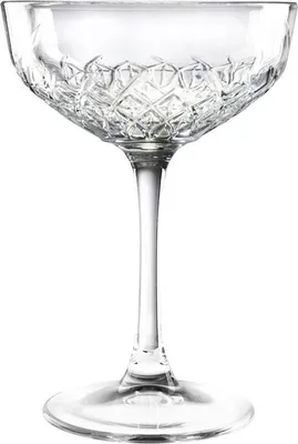 A clear, studio shot of a crystal coupe glass with a diamond-cut pattern on a white background.