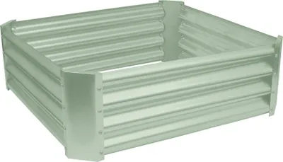 A square raised garden bed made of corrugated metal.