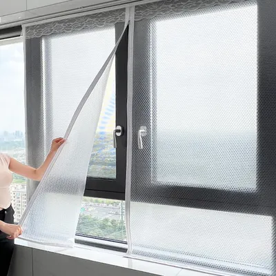 Immagine prodotto di Solidchoice - Kit di isolamento per finestre - Pellicola termica resistente agli agenti atmosferici con sistema di fissaggio a strappo (130 cm x 100 cm)