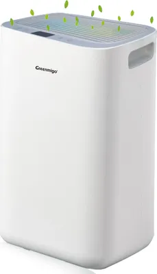 A white air purifier with green leaves floating above it.
