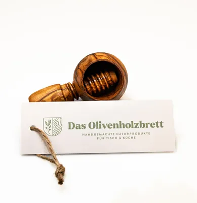 Produktbild von Nussknacker aus Olivenholz mit Schraubgewinde, runde Form
