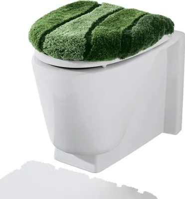 A toilet seat cover with a green, striped, plush design is placed on a white toilet.