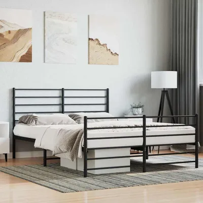 A bedroom scene with a metal bed frame.