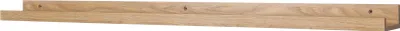 A wooden shelf with visible screw holes.