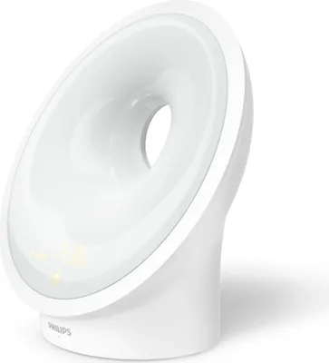 A white Philips wake-up light alarm clock is shown against a white background.