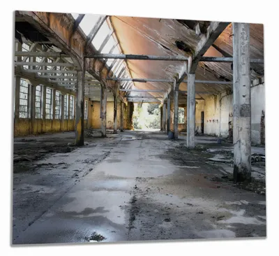 Produktbild von Wallario Herdabdeckplatte aus Glas, Größe 60 x 52 cm 1-teilig, Motiv Alte Industriehalle  leerstehend und einsam