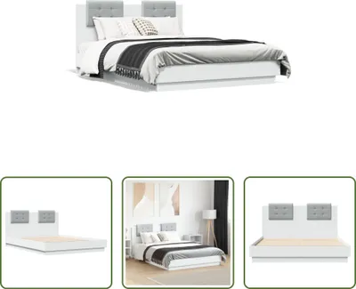 A white bed frame with a gray upholstered headboard, shown from a slightly elevated angle.