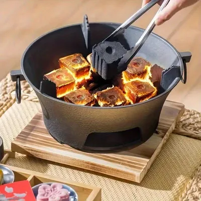 Obrázek produktu pro Gril na dřevěné uhlí, průměr 23 cm, hmotnost 2,9 kg, vhodný pro 2-3 osoby, odolná konstrukce z litiny, kompaktní design