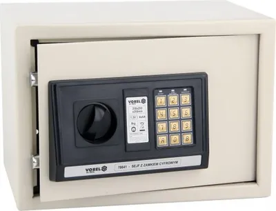 A beige safe with a black electronic keypad and a dial is shown against a white background.