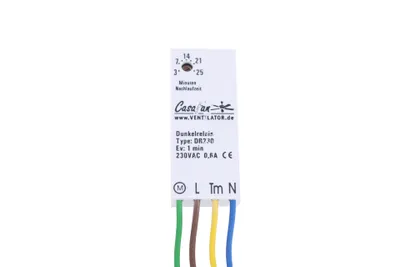 A close-up studio shot of a white electronic timer module with wires attached.