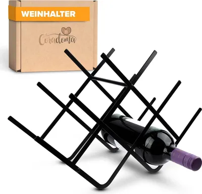 A wine bottle holder with a bottle of wine placed in it, with a cardboard box in the background.