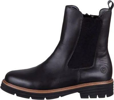 A black leather Chelsea boot with a black elasticated side panel and a thick black sole with a tan trim.