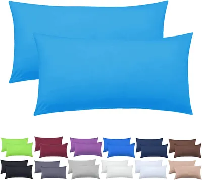 Two turquoise pillowcases are shown in the foreground, with a grid of various colored pillowcases in the background.