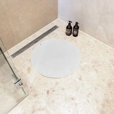 Obrázok produktu pre Protiskluzová sprchová podložka Ø 55 cm, biela