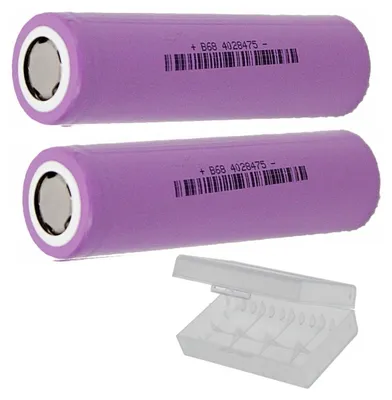 Two purple cylindrical batteries and a clear plastic battery case.