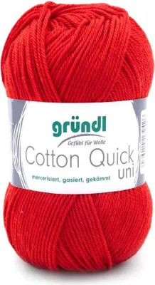 A ball of red yarn with a label.