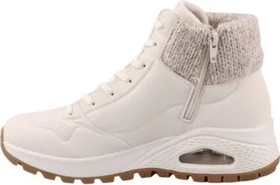 A side view of a white women's high-top sneaker with a knitted collar and a brown sole.