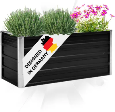 A black raised garden bed filled with plants and flowers, with a banner indicating it is designed in Germany.