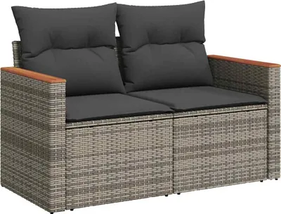 A two-seater outdoor sofa made of gray poly rattan with dark gray cushions and wooden armrests.